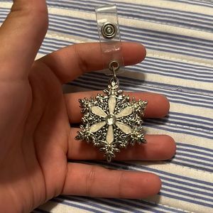 This is a I.D badge holder snowflake shaped perfect for any body who love winter
